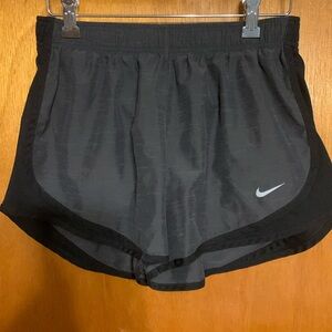 Nike Dri-Fit women’s running shorts size medium.